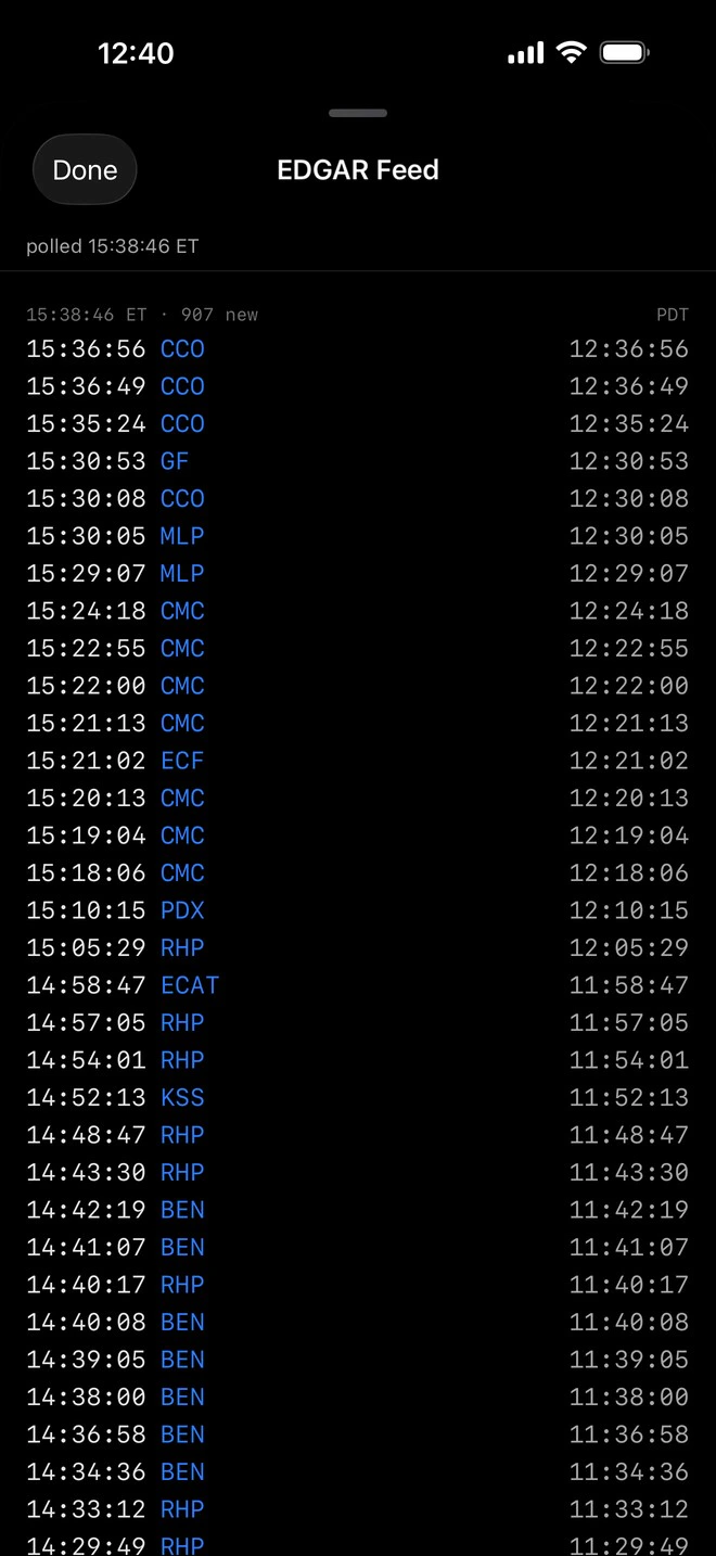 The EDGAR Feed opened full screen, filing by filing with each ticker and its time in Eastern and local time, newest first